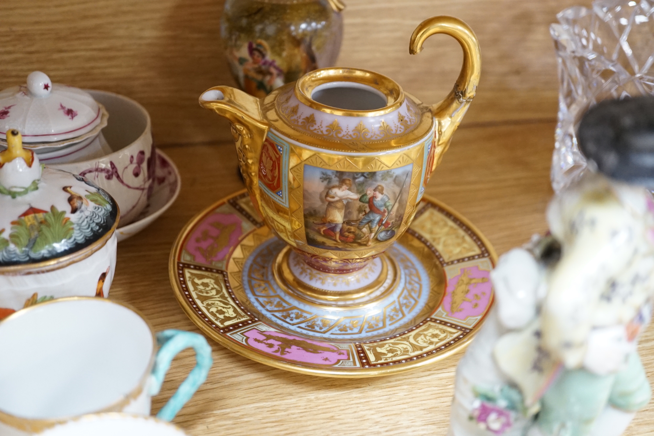 19th century Continental tableware, including Richard Ginori Capodimonte style cups and a porcelain figure group of a gentleman and dog, largest 25cm high